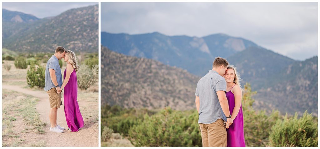 Couple posing in front of the Sandias for an Albuquerque engagement photo session.