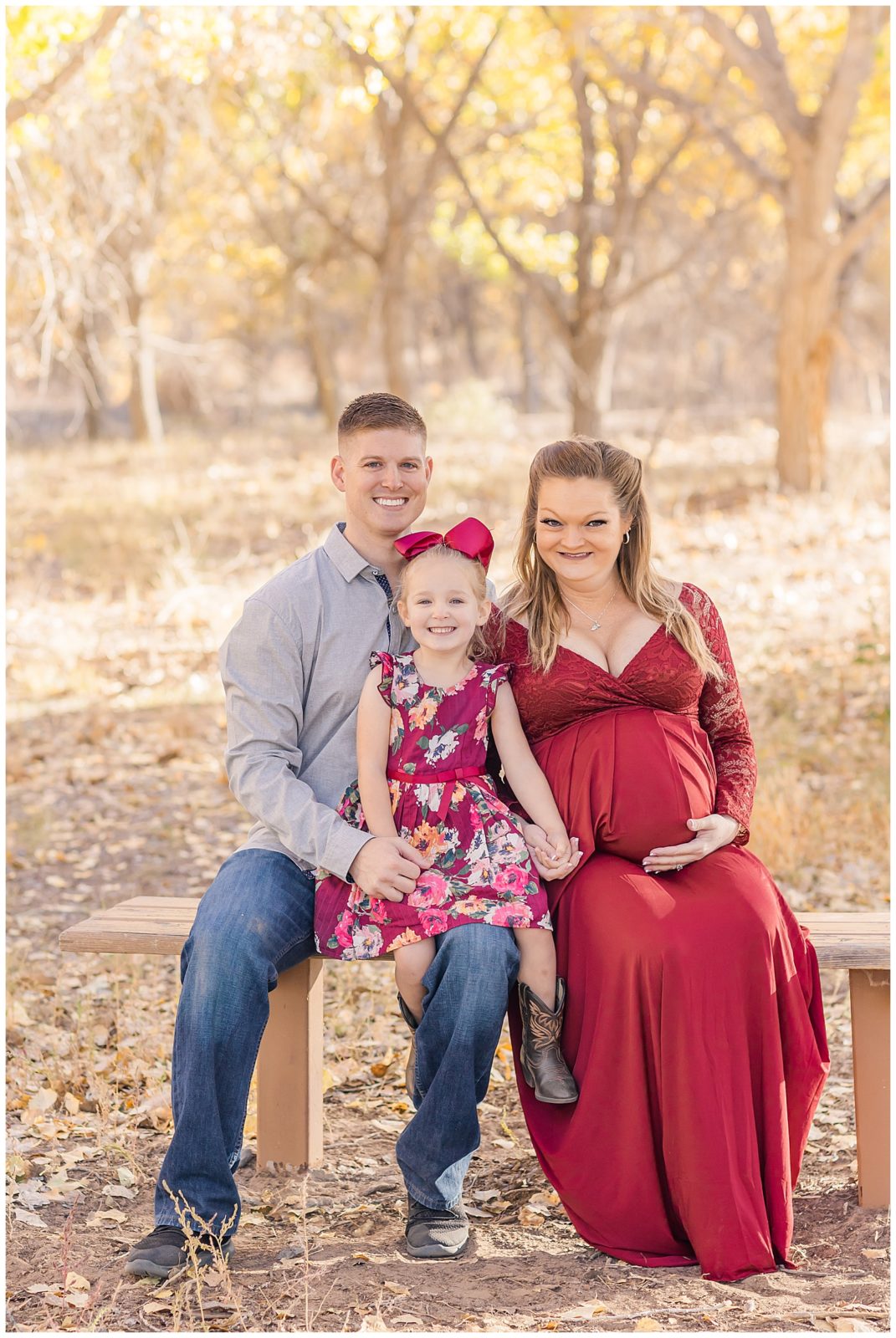 Military family smiles during a maternity session