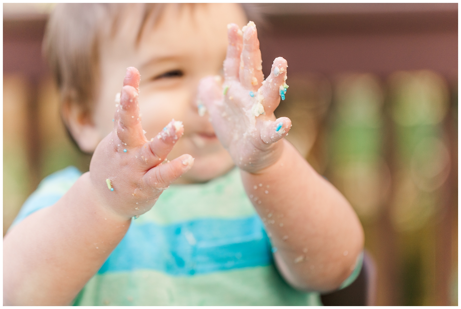Messy baby hands during a Virginia cake smash session