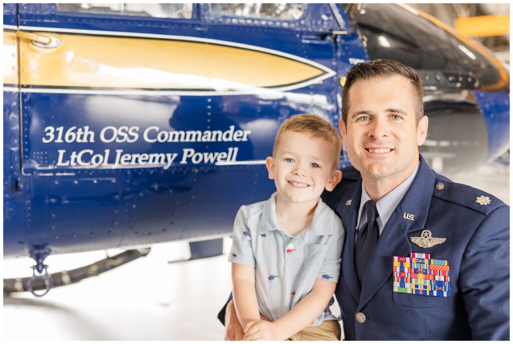 Father and son with an Air Force helicopter