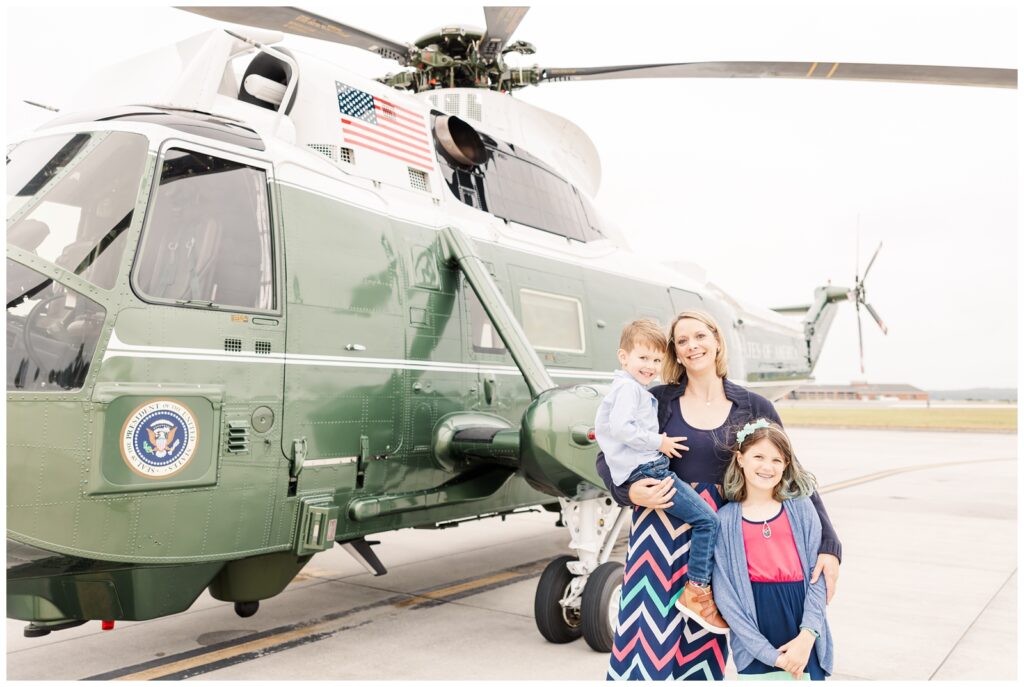 Marine wife and kiddos in front of Marine One aircraft