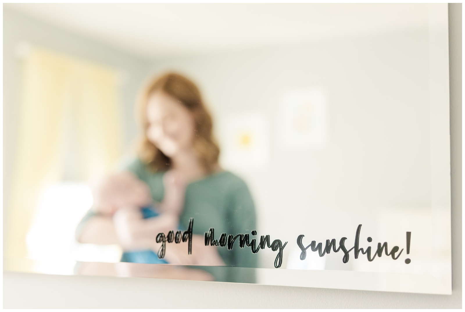 Good Morning Sunshine mirror decal with mom holding baby in the background