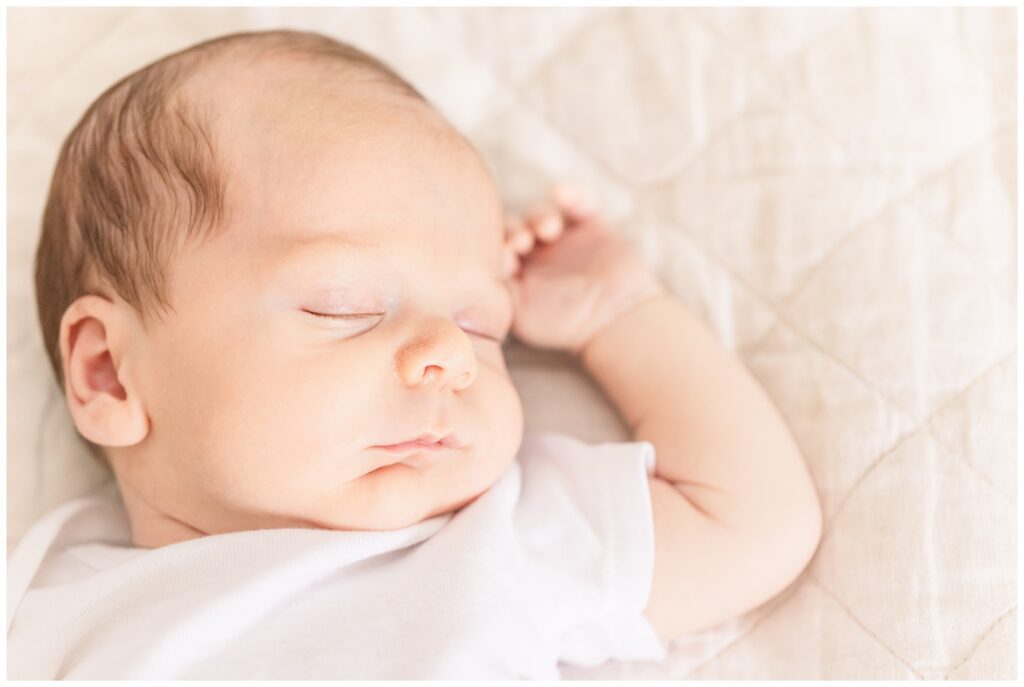 Sleeping baby during NOVA lifestyle newborn photo session