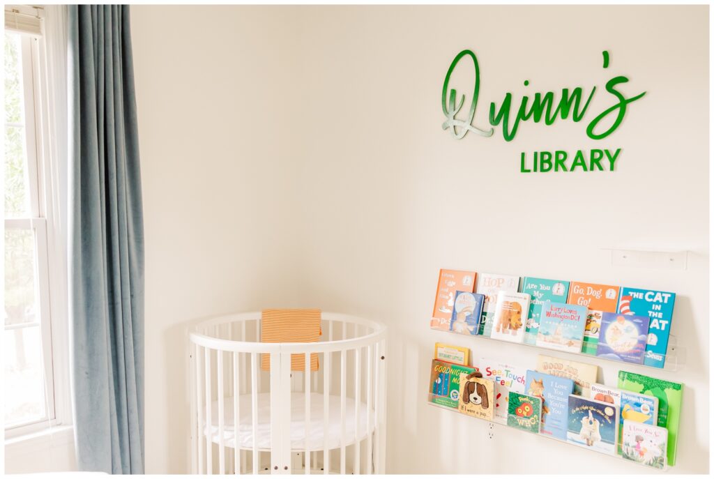 Baby's boy's nursery with Quinn's library sign
