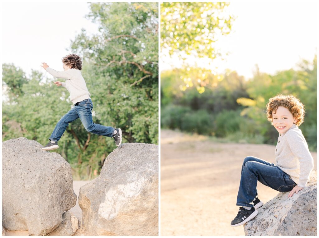 Little boy climbing and jumping between rocks