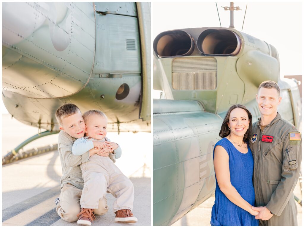Brothers hugging in front of a helicopter during flight line family photos
