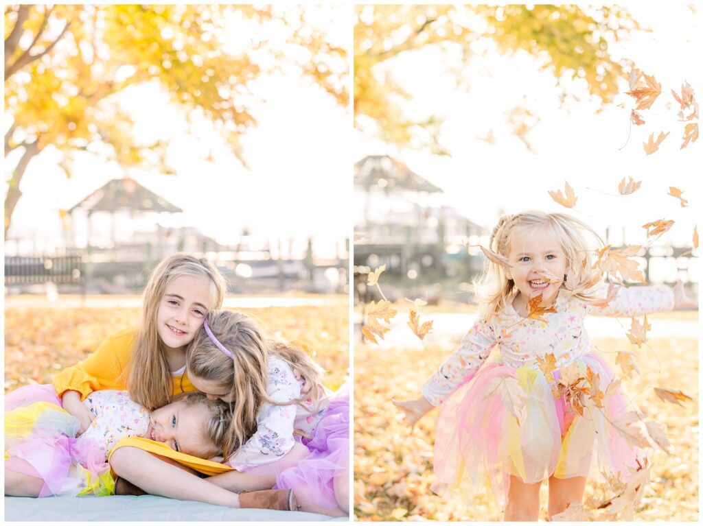 Sisters snuggling under a yellow fall tree