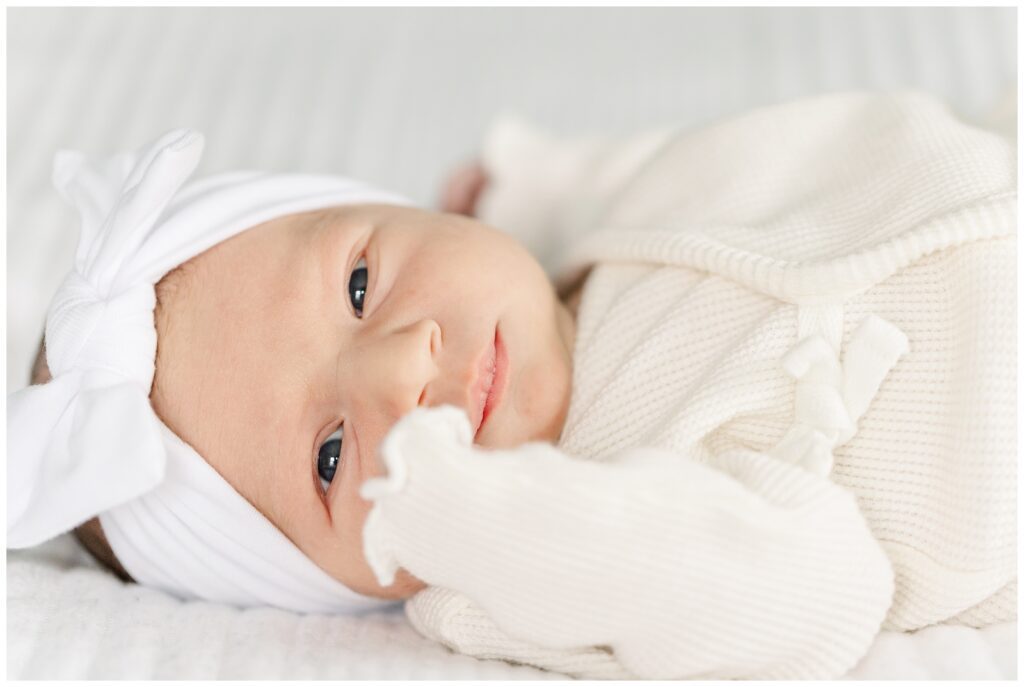 Awake baby girl during her DMV newborn photography session
