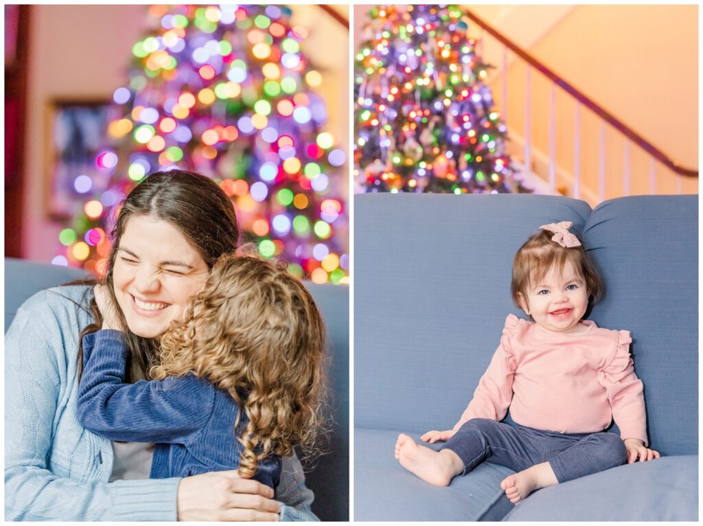 Young girl giving Mom a kiss in front of the Christmas tree