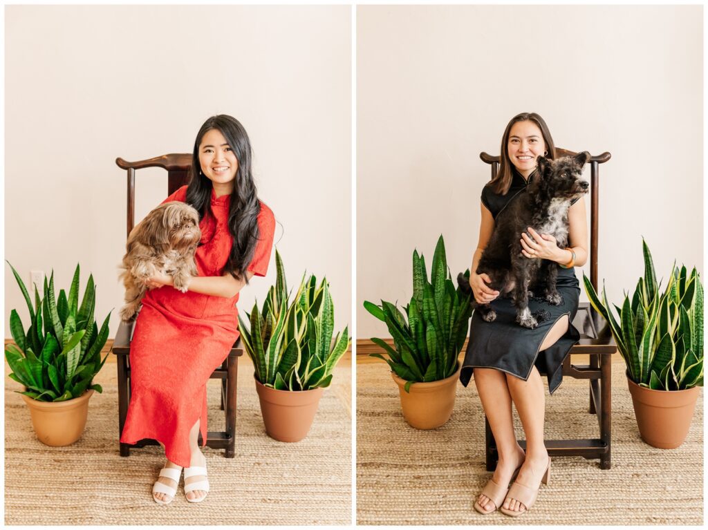Two girls sitting and holding their dogs during an extended family photography session