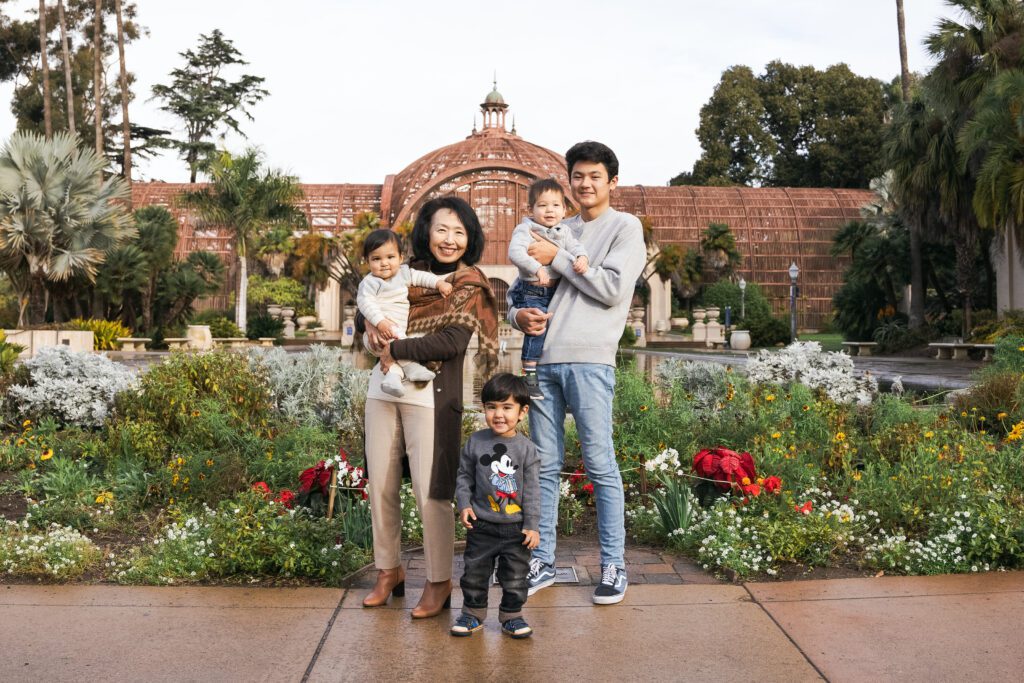 Family standing at Balboa Park in Marisa Glaser Creative's San Diego, CA photography spotlight