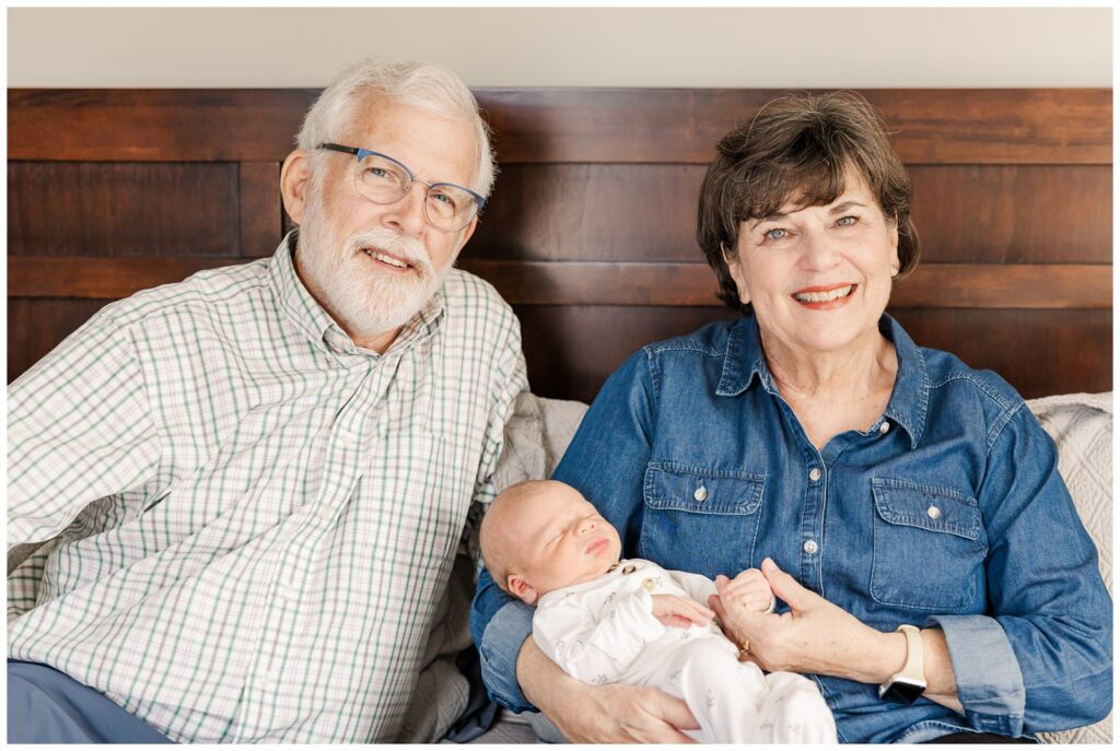 Grandparents holding their newest grandson