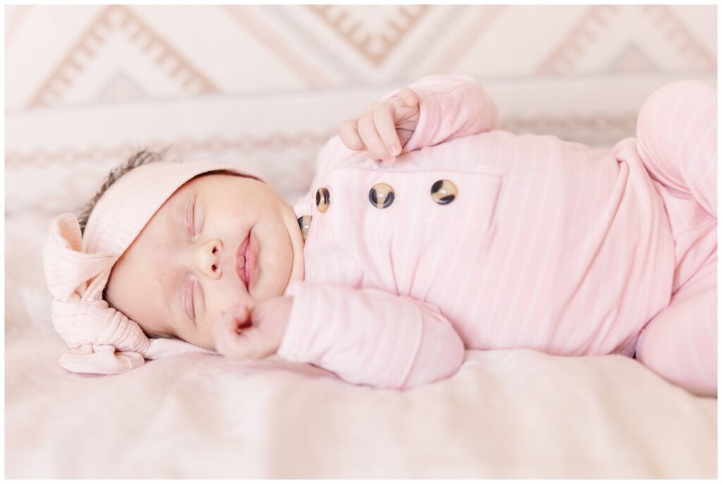 Sleeping baby girl captured by Erin Thompson, Virginia newborn photographer
