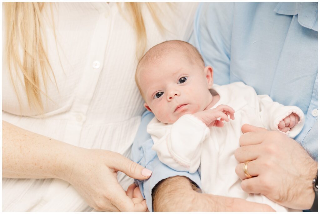 Close up of wide-awake baby during Arlington newborn photos