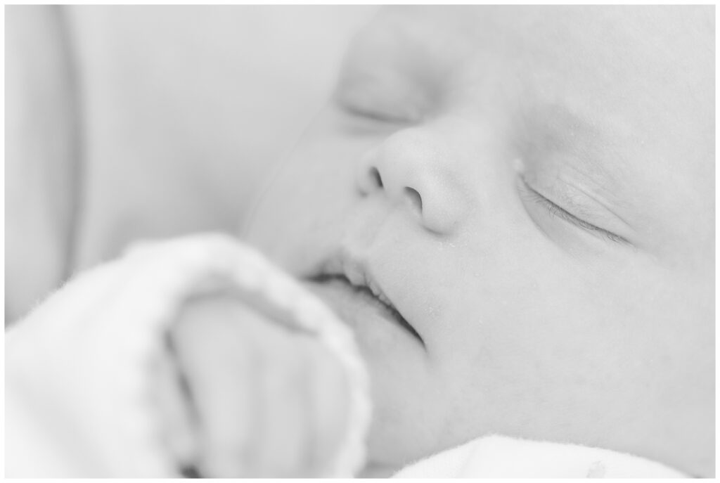 Closeup face details of newborn baby girl