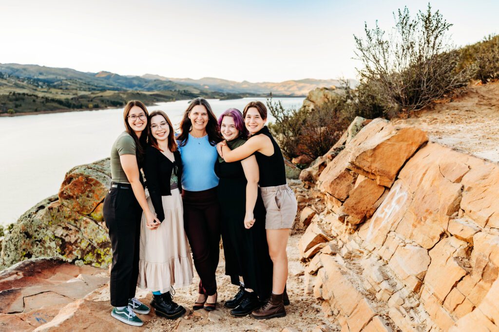 Five ladies standing together at Horsetooth Reservoir in Christa Paustenbaugh's Cheyenne, WY photography spotlight