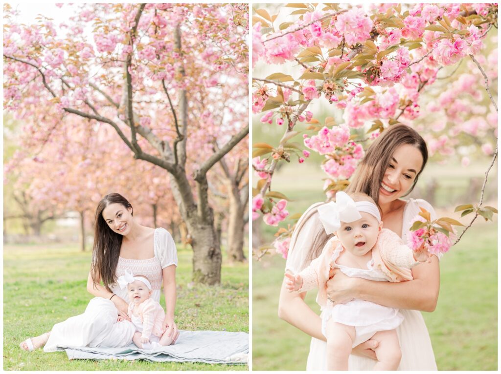 Mom and daughter sitting in a grove of Kwanzan cherry blossoms at Hains Point