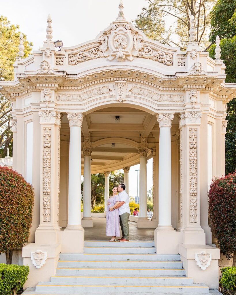 Couple standing amidst beautiful architecture in Balboa Park in Jen Jordan's MCAS Miramar photography spotlight