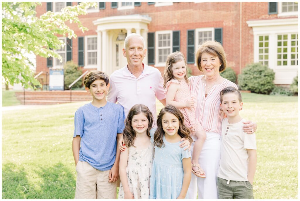 Grandparents smiling with their grandkids during Maryland extended family photos
