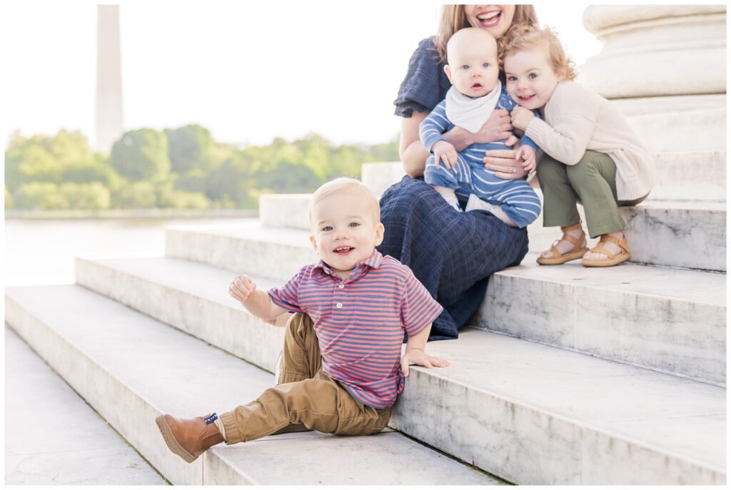 Mama with her kiddos on the steps of the Jefferson Memorial
