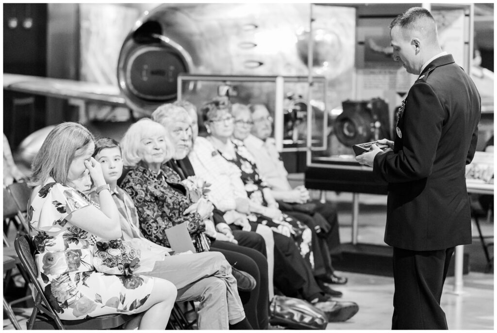AF retiree giving gift to his wife