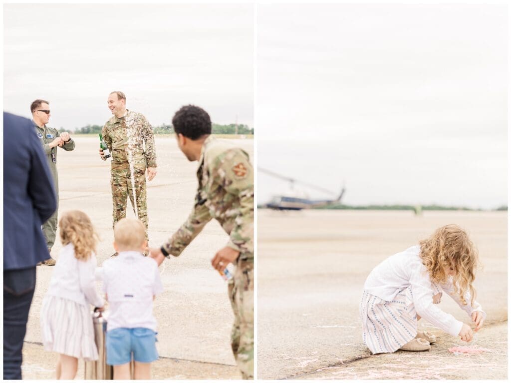 Little girl playing on the flight line by a Colorado Springs fini flight photographer
