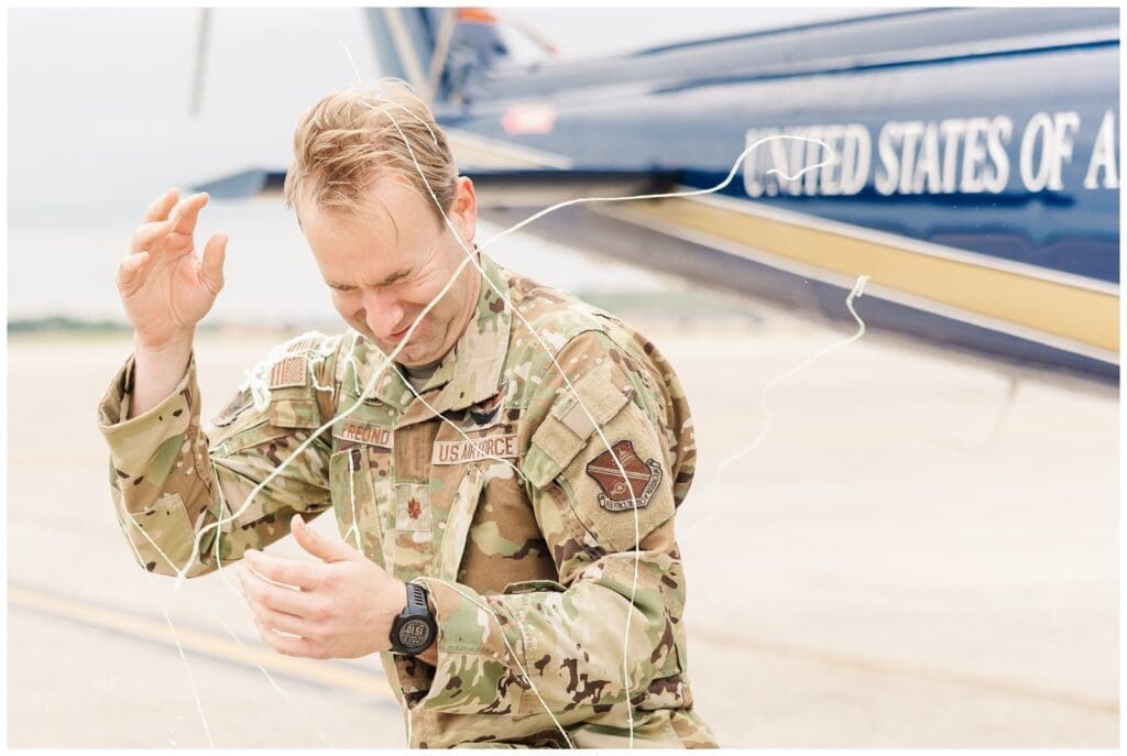 Pilot covered in silly string by a Colorado Springs fini flight photographer