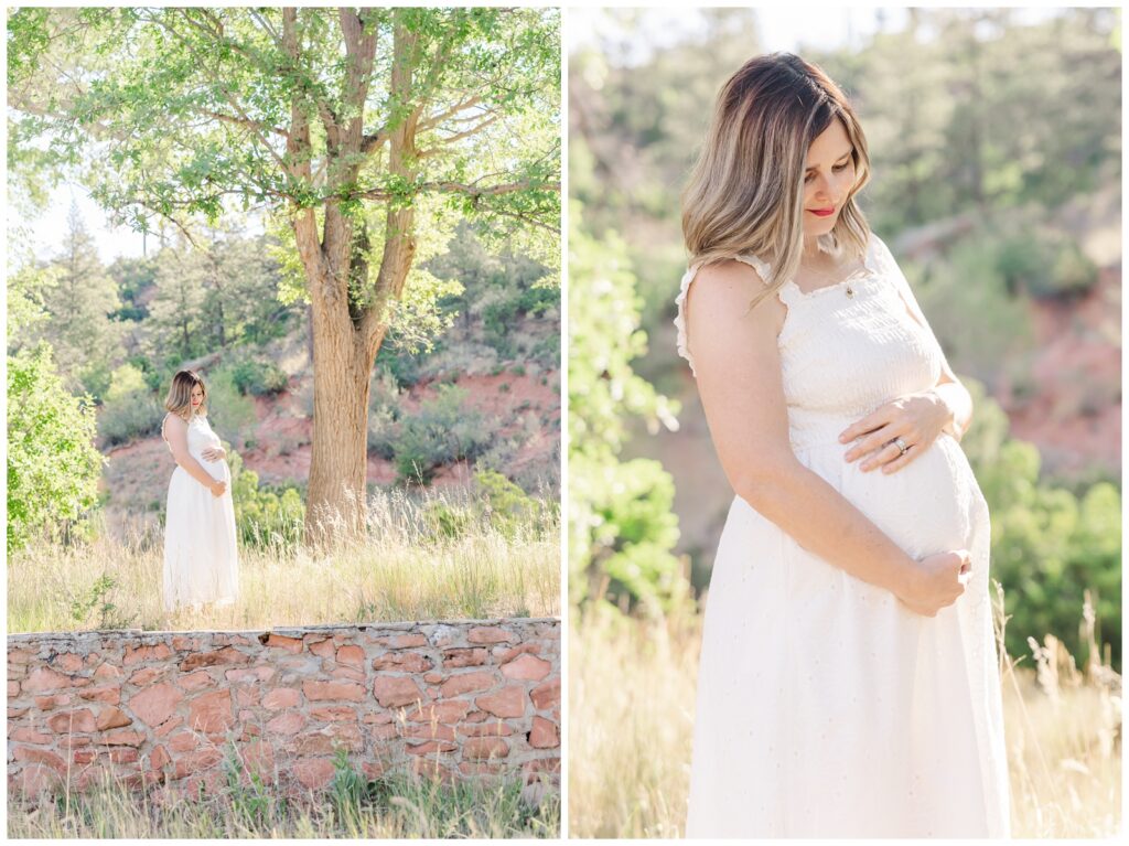 Pregnant mama standing near a wall and tree at Red Rock Canyon Open Space