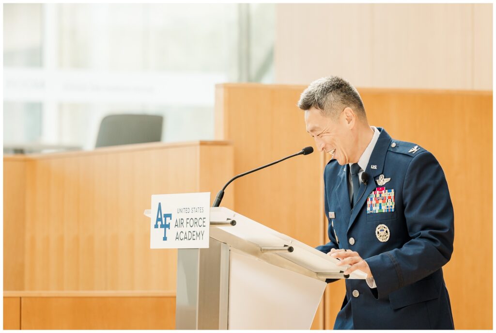 Close up of presiding officer speaking at a USAFA photography session